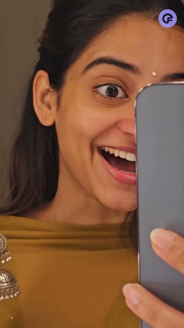 Selfie-style ad for oxidised silver jhumka earrings